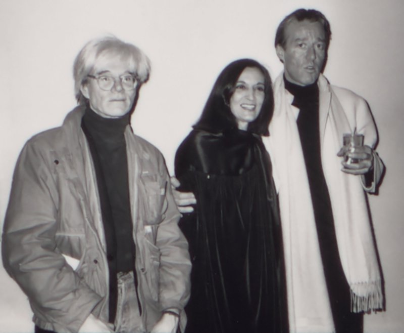 Black and white photo of artists Andy Warhol, Marisol, and Roy Halston Frowick
