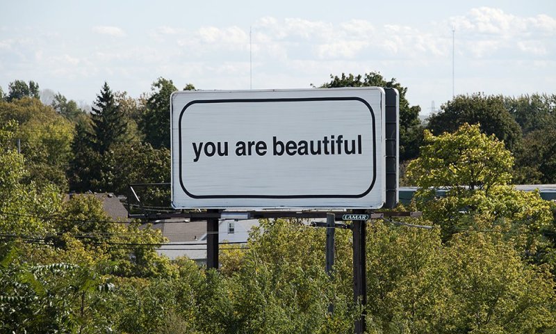 Matthew Hoffman’s You Are Beautiful billboard at Hyde Park Boulevard and Seneca Avenue. Photograph by Tom Loonan.