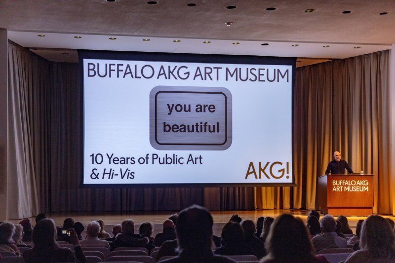 A person presenting on a stage