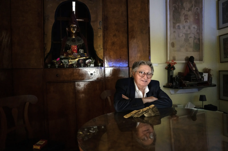 A man sitting in front of a table