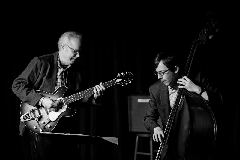 Black-and-white photograph of Bill Frisell & Thomas Morgan performing