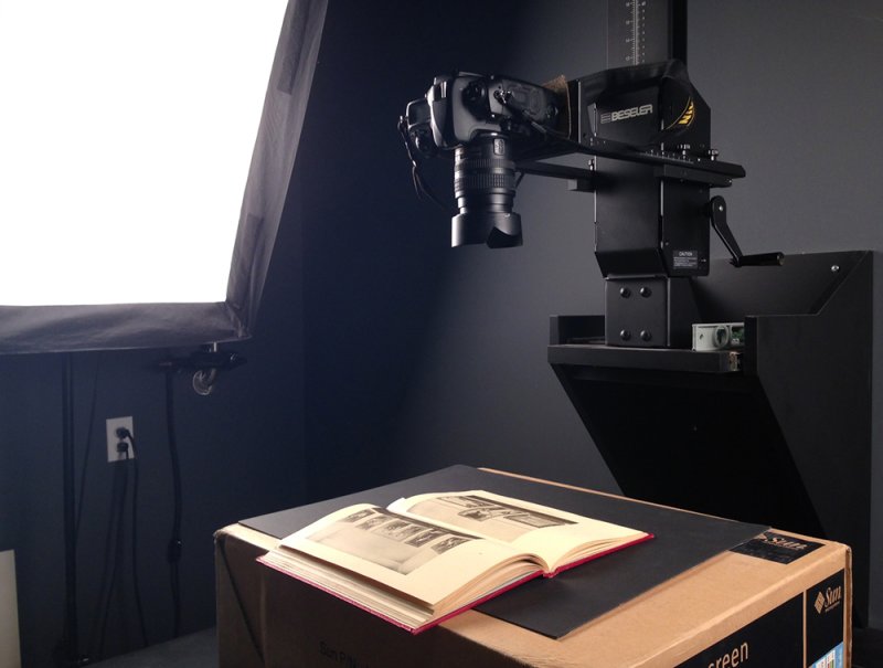 Photograph of a camera taking a photograph of a book