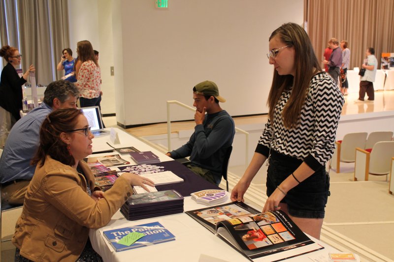 Teens talk to college representatives at the 2015 AK Teens College Art Career Day
