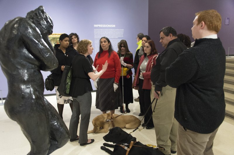 Visitors on a Verbal Description Sensory Tour