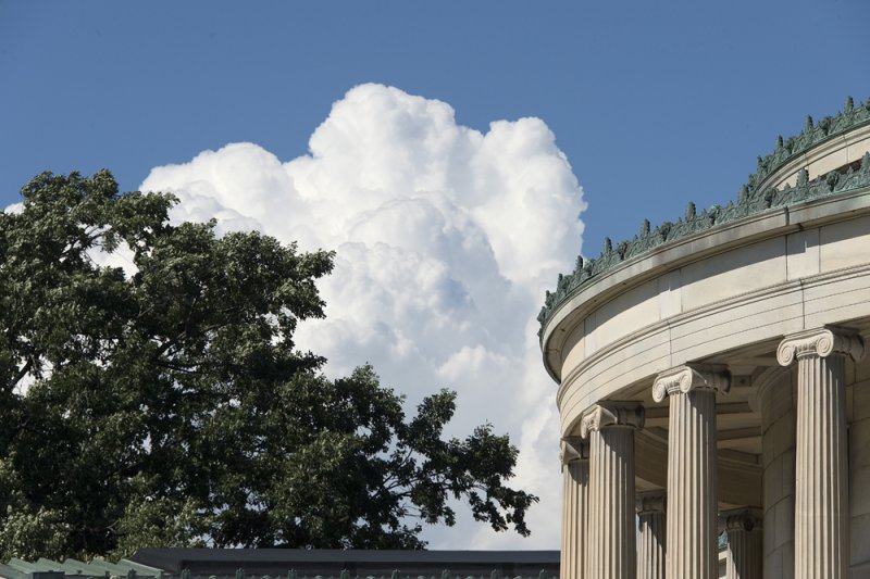 Part of the 1905 Building with sky and clouds in the background
