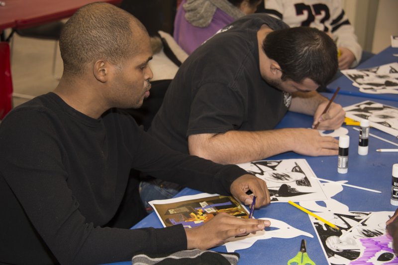Visitors create art in the classrooms