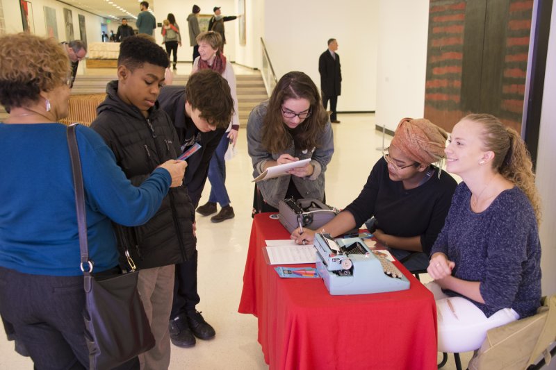 Young poets from Just Buffalo Writing Center create live short-order ekphrastic poems for M&T FIRST FRIDAYS visitors