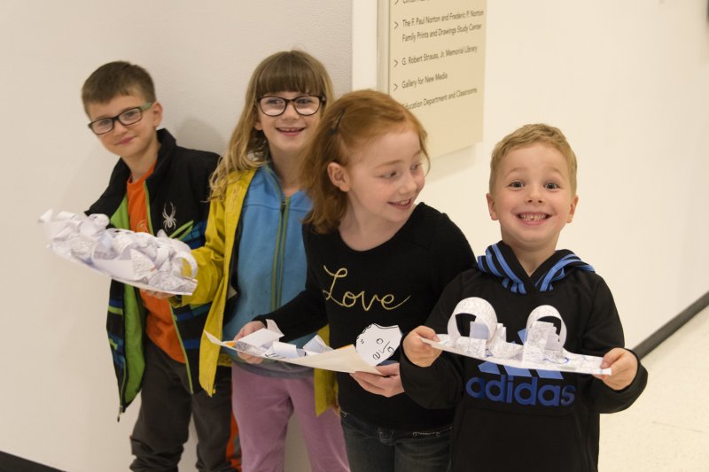 Kids with sculptures