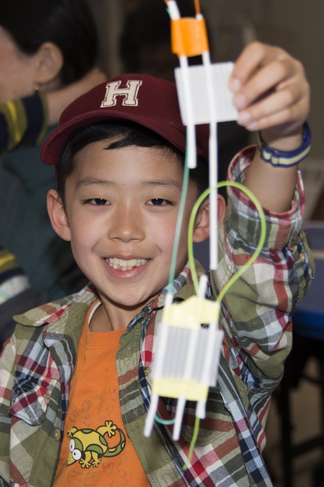 Young boy with an art activity. Photograph by Tom Loonan.