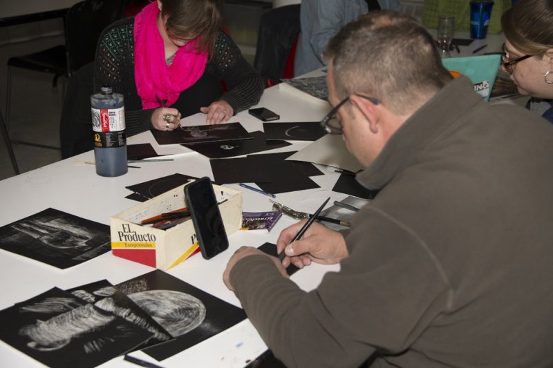 Adults drawing in the classroom