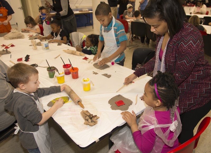 Families making art in the classroom