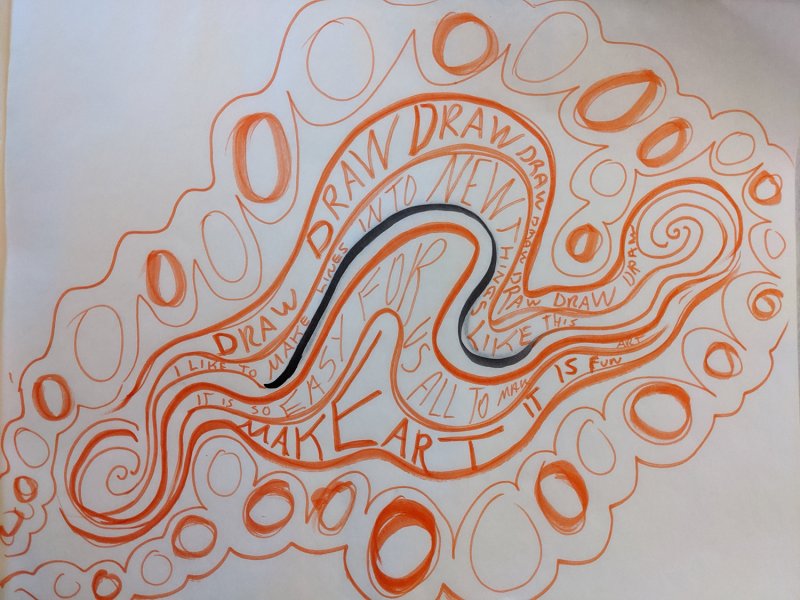 A drawing of orange lines and words