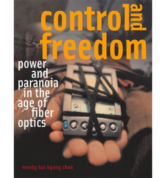 Cover of Control and Freedom: orange text on image of person's hands bound to a palm pilot