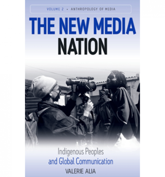 Cover of The New Media Nation: a person points a camera at another