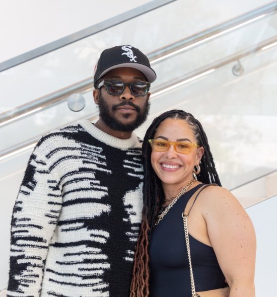 Two people standing together and smiling for a photo